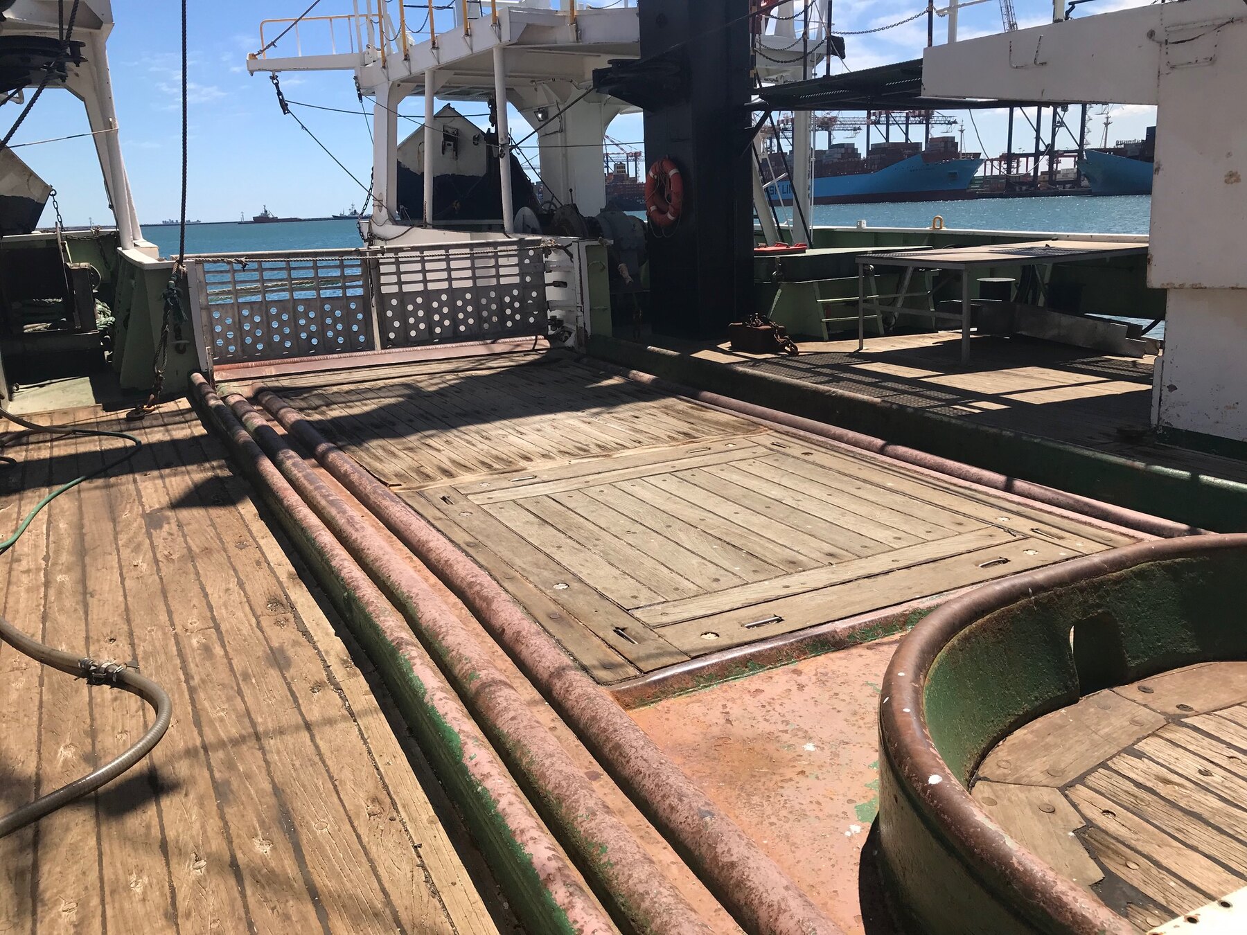 Original weathered wooden deck before renewal