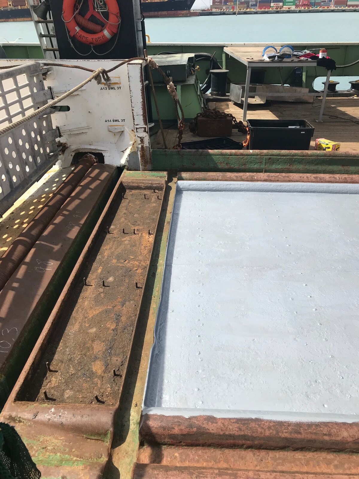 Exposed steel deck prepared and primed