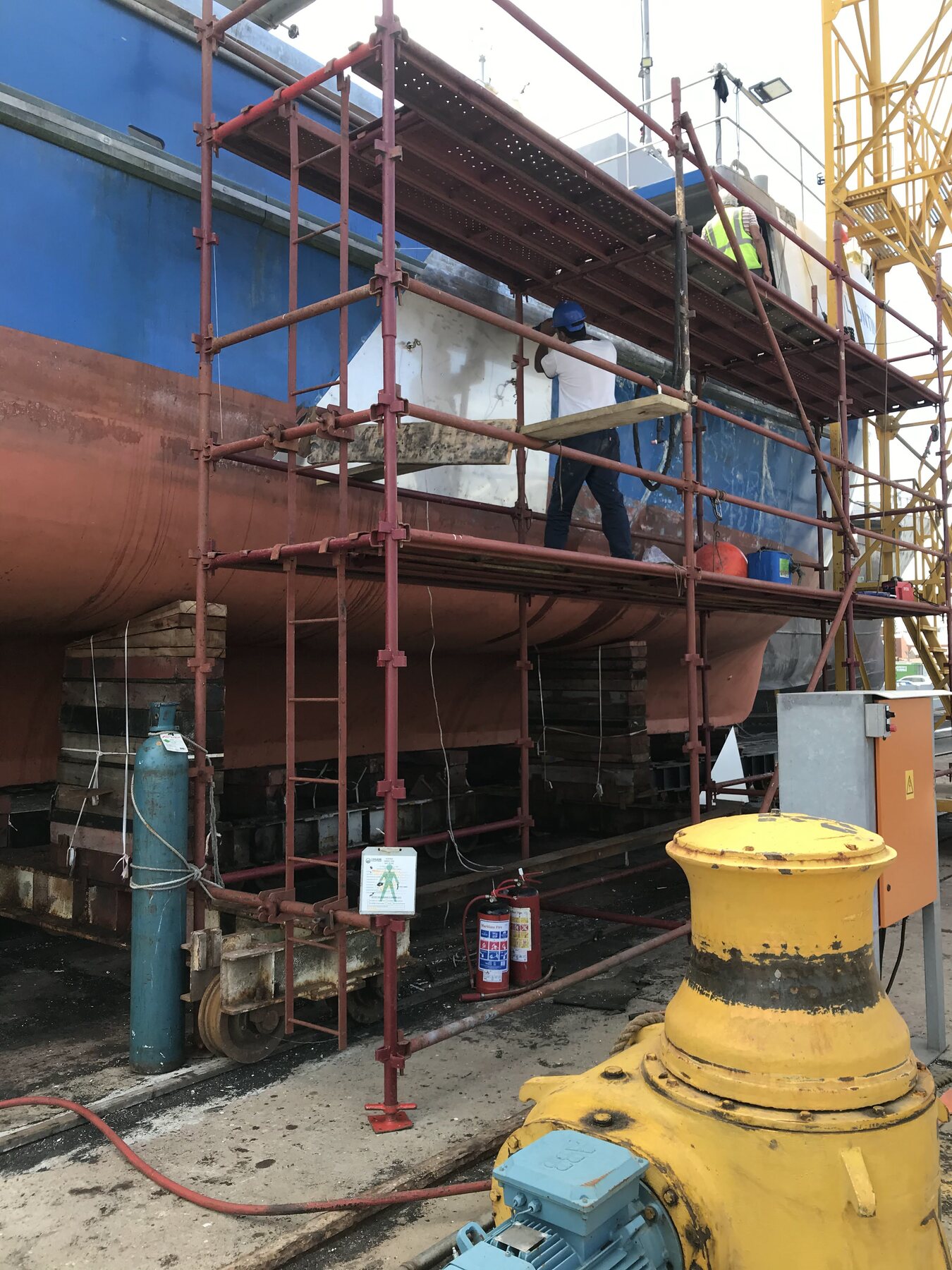 Scaffolding access to stainless steel plate repair over a mild steel vessel hull